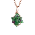 Detailed macro view of handmade copper wire-wrapped star-shaped ruby in zoisite pendant - Antique Copper + Ruby in Zoisite