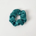 Detailed top view of a dark emerald green silk satin scrunchie with elegant pleats - Without Card / Teal