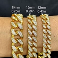Three gold 12mm to 19mm Cuban link bracelets with rhinestones shown on a wrist - 18 Inch (45cm) / Gold 15mm Insert Clasp
