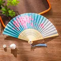 Sky blue gradient folding fan with cherry blossom pattern and blue silk tassel - 16 Winter Fragrance