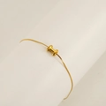 Luxurious gold-tone stainless steel bracelet featuring a 3D polished letter H charm - Letter I
