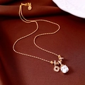 Detail of 18k gold plated necklace with cushion cut zircon and clover charm on silk - Gold