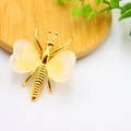 Exquisite golden bee brooch with heart-shaped translucent yellow resin wings - Gold Plated Clear Quartz