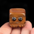 Handcrafted tiger eye stone monster cube figurine with natural brown wood grain texture - Tiger's Eye