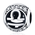 Detailed macro view of silver Libra zodiac bead charm with sparkling clear zircons - Libra