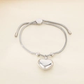 Detailed view of silver heart pendant bracelet with adjustable snake chain and sliding clasp - Steel Color Snake Bone Heart Style (KB184664-Z)