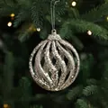 Silver glitter spiral hollow Christmas ball ornament on tree branch decoration 10cm - Flat Ball Style