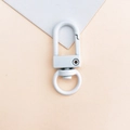 White 360-degree rotating lobster clasp keychain for DIY bag accessories on pink background - White
