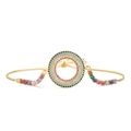 Detailed shot of 18K gold plated bracelet with colorful cubic zirconia and adjustable chain - Round Multicolor Zirconia