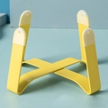 Modern elevated yellow cat bowl stand with X-shaped metal frame and non-slip pads - Elevated Cross Metal Stand / Yellow