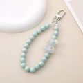Detail of light blue pearl beads and iridescent bear pendant on a silver keychain - Charm / K1692 Bear Pendant Green