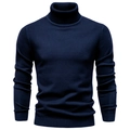 Close-up of navy blue men's turtleneck sweater showing fine knit texture and ribbed cuffs - Turtleneck Navy Blue