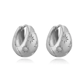 Retro silver hoop earrings with star pattern and zircon inlay on a white reflection - Silver with White Stone Star Earrings