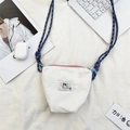 White canvas crossbody phone bag with colorful strap and letter patch for casual style - White