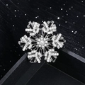 Elegant rotating snowflake brooch in silver with black and white rhinestones - Silver with Black & White Crystal