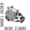 Dettaglio ricamo di una simpatica toppa a forma di mucca con indicazioni di misura - Stile Mucca Seduta (1号)