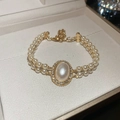 Double-strand pearl bracelet with large oval centerpiece and gold crystal accents - Vintage Double Row Oval Main Bead Style (Gold)