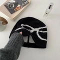 Black knit beanie with white bow jacquard pattern and soft texture for winter - Hat-Black