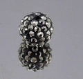Macro detail of 8mm black Shamballa clay bead with sparkling silver pavé crystals - Jet Black