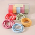 Macro detail of high elasticity colorful seamless hair ties set in a clear storage box - Color C Mixed Style (Boxed)