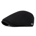 Classic black wool-like ivy cap with waffle texture and metal side plaque detail - Black