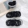 Bulk pack of durable black elastic hair ties in a clear jar and laid out neatly - 100 Pieces Set / Black