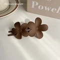 Matte brown floral hair clip featuring double flowers on a vintage banana claw grip - Brown