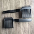 Set of two black professional barber fade combs on a natural wood surface background - Model B Black 2Pcs OPP Bag