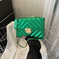 Green quilted chain bag with gold metal hardware and adjustable shoulder strap - Green