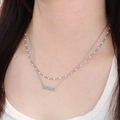 Close-up of double-layer silver MAMA letter pendant necklace on a woman's neckline - Style B Steel Color Double-layer Stacked