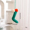 Pendaglio calza di Natale in maglia verde fatta a mano con pompon, altezza 12,5 cm - Calzini / Verde