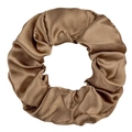 Detailed view of bronze brown satin scrunchie featuring smooth silk-like texture and folds - Caramel color
