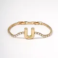 Gold-plated tennis chain bracelet featuring a sparkling zircon initial U pendant - Letter U