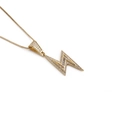 Detailed close-up of a gold-plated lightning bolt pendant with sparkling zircons on a box chain - Pave Zirconia Lightning Style (0765CX)