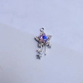 Close-up of sparkling star charm with purple gradient stone and rhinestone details - Pink Zirconia