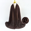 Solid brown pearl chiffon scarf for women draped on a mannequin with texture detail - Brown