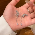 Detail of silver bowknot tassel earrings with rhinestones and teardrop pendant - A1690 Silver
