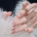 Elegant nude pink blush press-on nails with pearl shimmer finish on white feather background - Simple Blush Nails Glue Style (Y-468)
