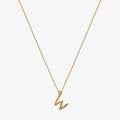 Macro detail of gold initial W pendant with lava texture and small crystals - 925 Silver / Gold - Letter W