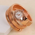 Elegant rose gold snake-shaped wrap watch with rhinestone bezel on a white stand - Rose Gold