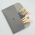 Set de brochas de maquillaje gris con virolas doradas y estuche plegable - 10 piezas Blue Bridge Juego Pequeño + Bolsa de Sobre