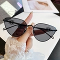 Cat eye sunglasses with black metal frame and gray lenses featuring emblem decor - Black Frame Black Grey Lens