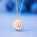Elegante collana rotante a girasole dorata con cristalli di zircone micro-incastonati - Oro 18K / Oro