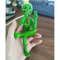 Green resin alien statue with flower crown and peace sign necklace sitting position - Smoking Alien Figurine