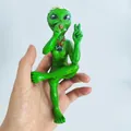 Green resin alien statue with flower crown and peace sign necklace sitting position - Smoking Style / Green