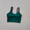 Close-up of high-impact dark green sports bra with double black shoulder straps - S / Dark Green/Black