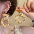 Close-up of woven rattan round drop earrings with wood detail on a female model - 2# Steel Needle - Rattan Coffee Round