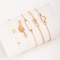 Detailed macro shot of 5-piece gold-toned charm bracelets with hearts and leaf pendants - MS8484 White