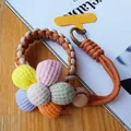 Adjustable woven wrist lanyard with a colorful knit sunflower and metal carabiner - Brown Khaki Style (With Yellow Patch)