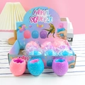 Colorful animal squeeze toys in egg-shaped packaging with speckled texture details - Unicorn Squeeze Toy